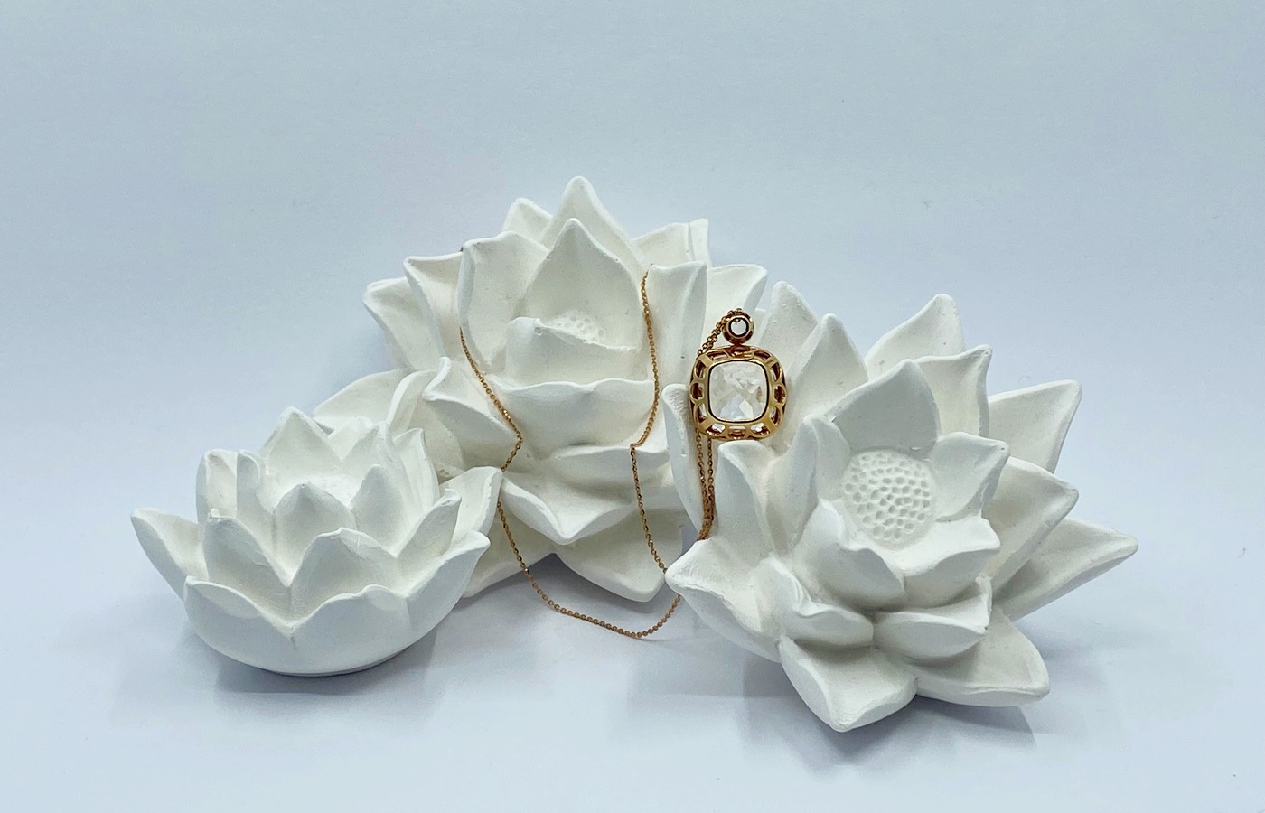 Collana in oro rosa, brillanti e cristallo di rocca